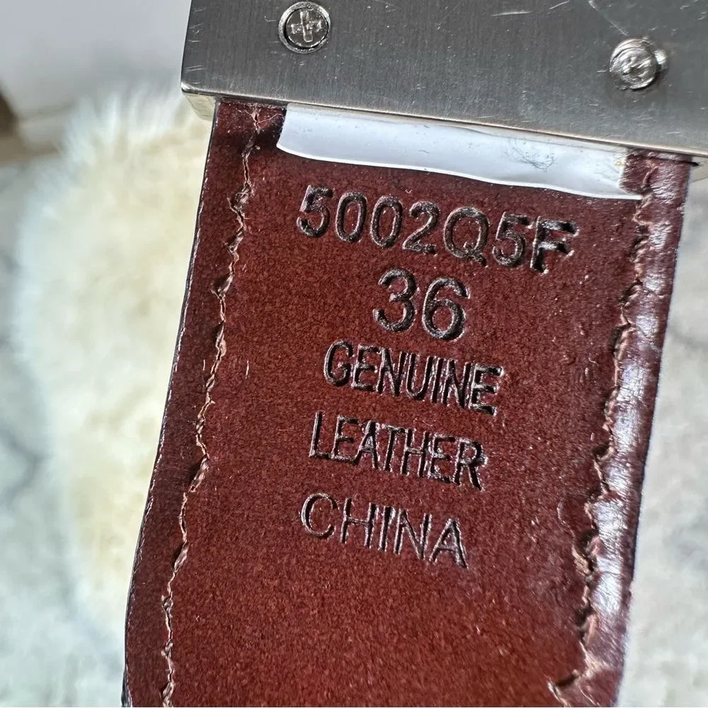 Elegant Black Leather Belt with Silver Buckle